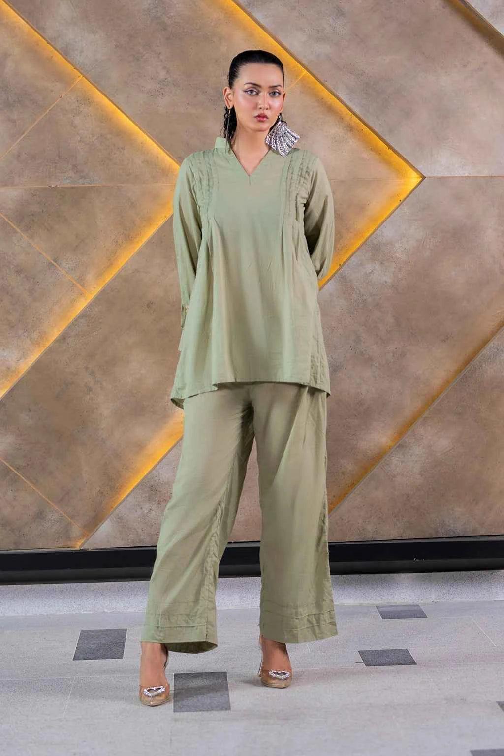 Step out in style with this chic Women's Co-Ord Set featuring a sophisticated grey corduroy fabric. This stylish ensemble comes with a shirt and trous